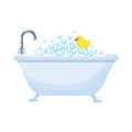 Bathtub full of soap foam bubbles with  yellow  rubber  duck Royalty Free Stock Photo